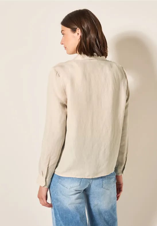 Blouse met knoop in de zoom